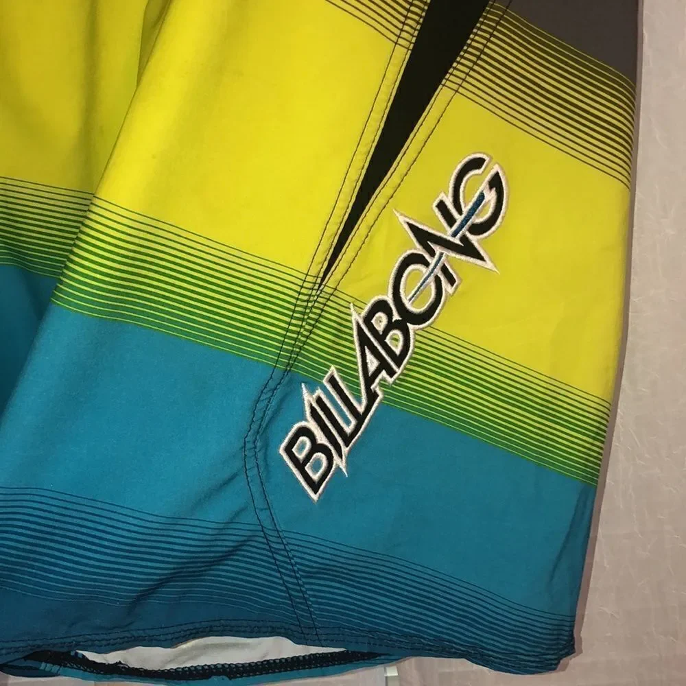 Billabong L ZeroGravityPlatinum Stretch Board Shorts Blue Yellow Gray